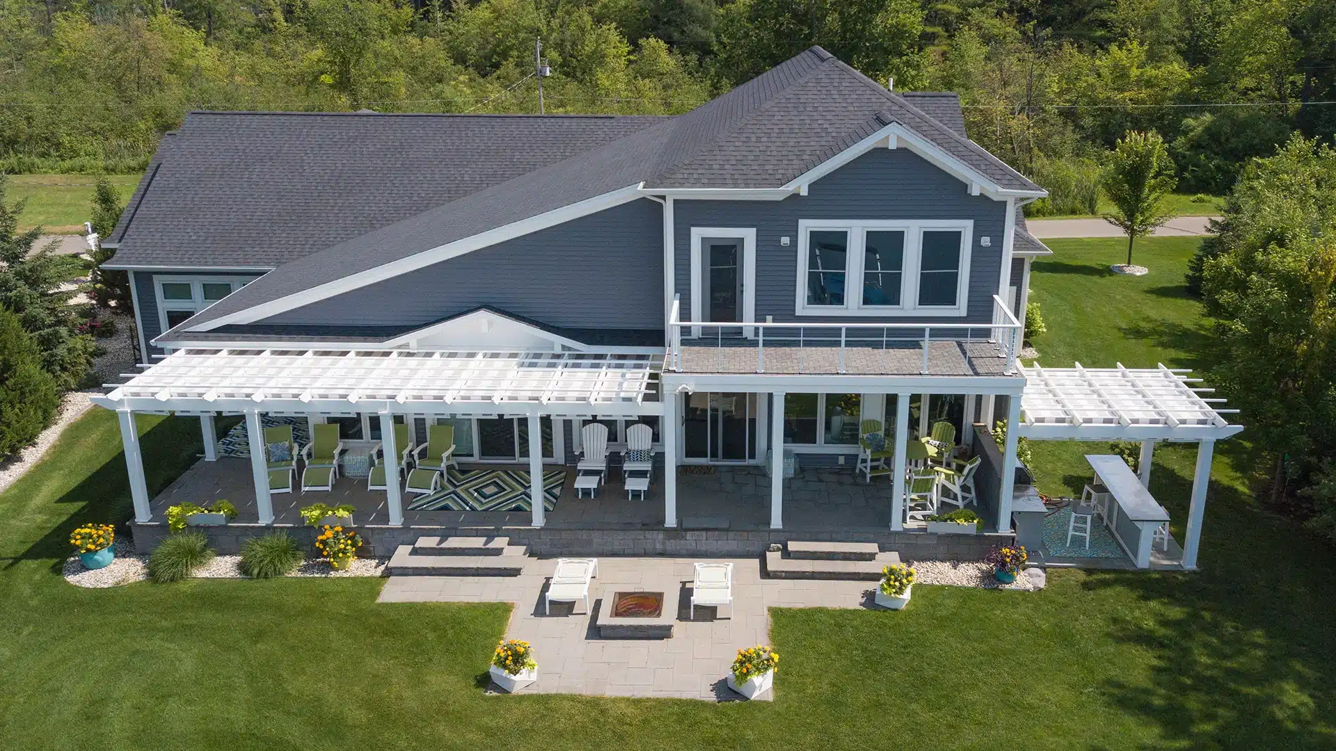 ShadeFlex canopies on Trex Pergola covering outdoor patio