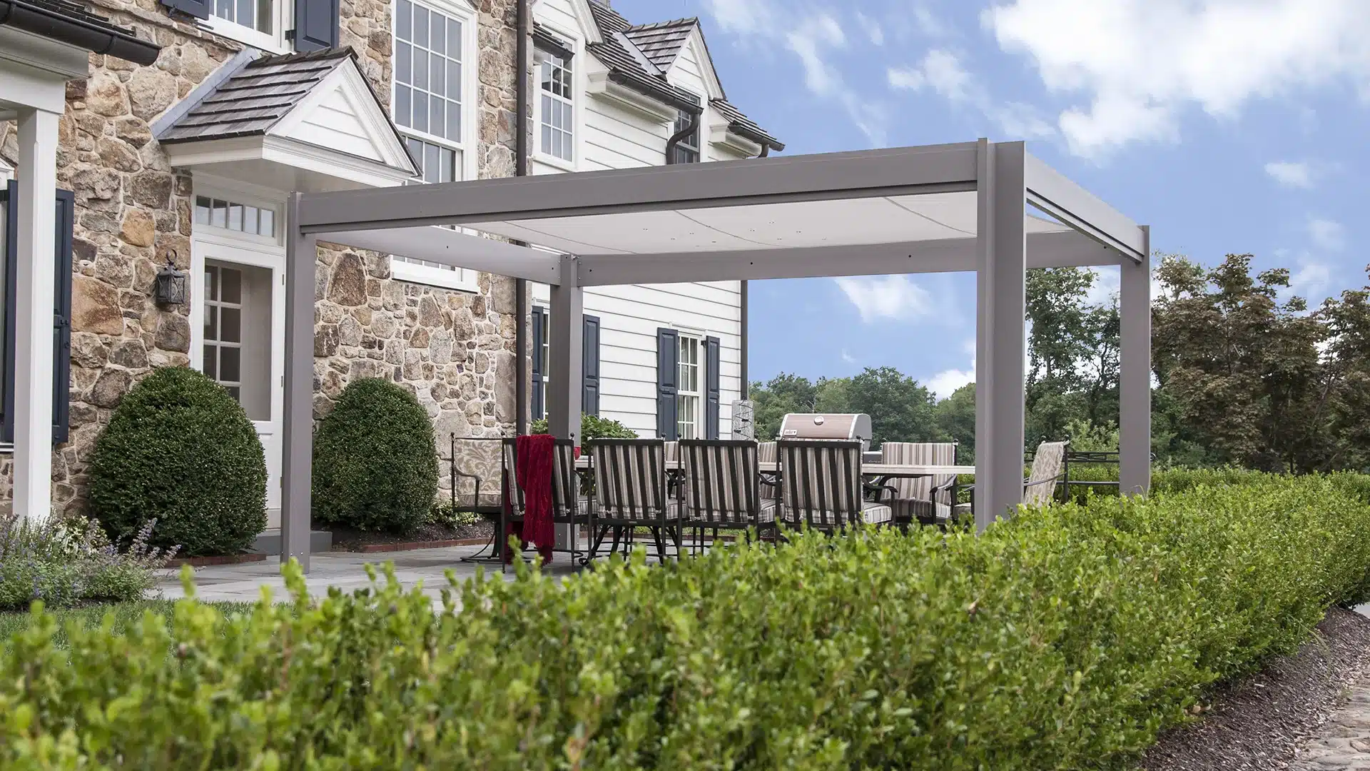 modern aluminum pergola over outdoor dining area